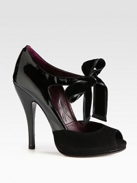 A large velvet bow with ribbon trim defines this suede and patent leather peep toe pump. Patent leather heel, 5 (125mm)Suede-covered platform, ½ (15mm)Compares to a 4½ heel (115mm)Patent leather and suede upper with velvet ribbon-trim bowPeep toeSelf tie bowLeather lining and solePadded insoleMade in Italy