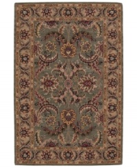 With a modern approach to traditional designs, the India House collection offers beauty to be appreciated for years to come. Meticulous hand-tufting results in truly artful detail. Featuring lush blooms against a rich olive green field, this rug is an exceptional addition to your home. (Clearance)