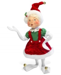 She'll be there with bells on. Wearing long elfin shoes and a velvety red jumper, this whimsical figurine inspires holiday fun wherever she goes. With the soft, flexible features and unmistakable style of Annalee dolls.