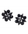 Nothing says simple sophistication more than a pair of stud earrings. This lovely design by Carolee features unique round-cut and marquise-cut jet glass stones. Crafted in hematite-plated mixed metal. Surgical steel posts. Approximate diameter: 5/8 inch.