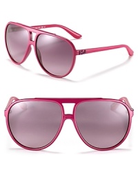 Up the style ante in these fuchsia aviators with metallic logo detail at temples.