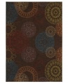 Featuring an iconic design that recalls American mid-century modern motifs, this casual Karastan rug is covered in bold mandala-like medallions in beautiful hushed hues. Woven from premium New Zealand wool, this rug offers alluring style and a blissfully soft feel underfoot.