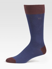 Contrast cuff, heel and toe define comforting socks that offer warmth without bulk. Mid-calf height Ribbed cuff 72% cotton/26% nylon /2% spandex Machine wash Imported 