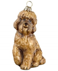 Lucky dog! Just begging for a home, this labradoodle ornament has puppy dog eyes and a beautiful brown coat in hand-painted glass by Joy to the World.