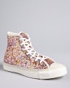 Like a private party for your feet, these sequin-encrusted Converse sneakers add lighthearted charm to casual days.