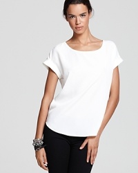 A plain white tee goes glam with this Aqua top, created in a luxe micro crepe with modern rolled sleeves and a cool back keyhole.