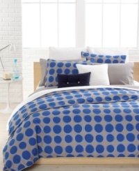 Sporty style meets preppy polish! This Sevres comforter set from Lacoste dresses your bed with a landscape of mesmerizing circles. White piped edges complete the modern look.