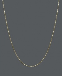 Spherical and cylindrical beads link together to form this more modern dot-dash style chain. Necklace crafted of 14k gold. Approximate length: 18 inches.