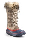 Bold and brilliantly hued, these faux fur-trimmed boots make a bright statement on the coldest of days. By Sorel.