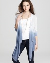 Slip away into the cozy confines of DKNY. A dose of dip dye makes this comfy cardigan chic.