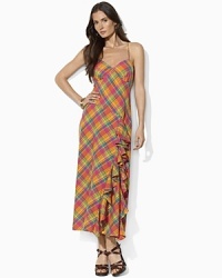 A vibrant-hued plaid lends seasonal appeal to a feminine maxi dress, crafted with a cascade of ruffles at the skirt and delicate spaghetti straps.