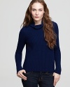 A solid rib knit blended from wool and yak in a shrunken turtleneck style.