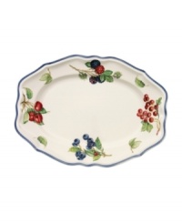 The Cottage Inn oval platter is a colorful addition to the sophisticated table. Lush, dancing clusters of ripened blueberries, raspberries and cherries are a stunning contrast on creamy white porcelain and lend every meal a touch of traditional elegance.