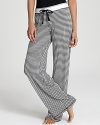 A charming, all-over houndstooth print graces these knit PJ Salvage pants.