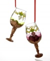 Add even more cheer to the season with wine glass ornaments featuring an elegant grapevine motif and elaborate bronze stems.