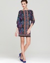 This Laundry by Shelli Segal jersey dress lends a bold look in a vibrant, multicolor print.