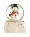 Lenox presents a very collectible snowglobe featuring a charming snowman dressed in festive winter gear. Useful as a paperweight or a holiday keepsake, it makes a great gift.