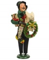 Ready to celebrate, this joyful man carries a wreath, stocking and more, all while singing beloved holiday carols. A very special figurine from the Bearing Gifts family, with the handcrafted charm of Byers' Choice.