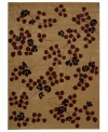 Take your decorating cues from nature's most beautiful scenery. This awe-inspiring area rug comes alive with heart-shaped blossoms and bold black flowers, hand-carved to add that dimension and eye-pleasing interest.