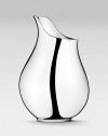 Voluptous yet stripped-down, this sleek stainless steel vase champions the clean lines and understated elegance celebrated in Scandinavian design.13H X 9W X 8DMirror finish stainless steelSigned by artist Ilse CrawfordImported