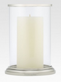 Gleaming glass and polished nickel is crafted to house a single pillar candle for a beautiful, ethereal effect. 8H X 5¾ diam.Glass and nickelImported