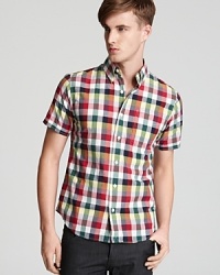 Colorful checks alert everyone to your laid-back attitude and keen sense of trend with this handsome short-sleeve button-down that's perfect for warm weather days.