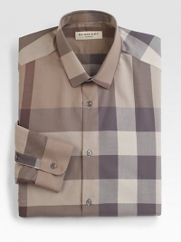 An expanded pattern of checks in a classic Burberry palette walks the line between dress and casual.Modified spread collarButton frontBarrel cuffsCottonDry cleanImported