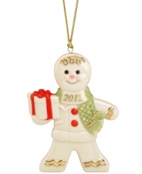 Spice up holiday decor with a sweet gingerbread boy by Lenox. Featuring a button nose, quilted scarf and radiant gold accents, this cookie-cutter cute ornament ensures you'll never forget the 2012 season.