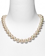 Majorica 14mm round white pearl necklace, 20 strand. Organic man made pearl necklace from Mallorca, Spain. Goldtone and pearl slide lock closure. Approximately 20 in length.