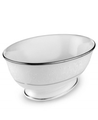 Pure opulence. Posh opalescence. This classically designed line of Lenox dinnerware and dishes is accented by a platinum rim and a delicate flourish of vine-like, white-on-white imprints with raised, iridescent enamel dots. Great gift for a housewarming, wedding or yourself.