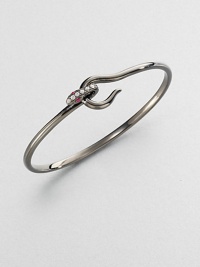 EXCLUSIVELY AT SAKS.COM From the Meadowlark Collection. An exotic yet minimalist design featuring a snake design accented with sparking white sapphires and rich rubies. Black rhodium-plated sterling silverWhite sapphire and rubyDiameter, about 2Hook closureImported 