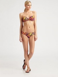 A tropical-hued animal print meets a timeless swim design. Plus, the gilded side detail is beyond chic.Stretch bottomSide detailFully lined92% nylon/8% spandexHand washImported Please note: Bikini top sold separately. 