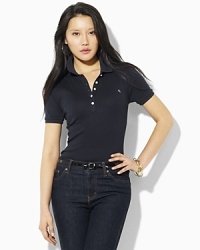 Designed for a classic, feminine fit in soft finely ribbed cotton, this short-sleeved polo shirt is a wardrobe staple.