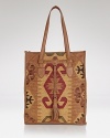 Isabella Fiore crafts this all-purpose tote in tapestry fabric and leather, perfect for introducing bohemian luxe style to your day-to-day look.