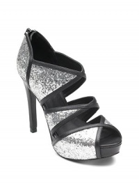 Glitter-covered cutout leather creates dramatic angles that reveal hints of skin, for a glamorous statement.Leather-covered heel, 4 (100mm) Covered platform, ½ (15mm) Compares to a 3½ heel (90mm) Peep toe Glitter covered cutout leather Back zipper Leather lining and sole Padded insole Imported