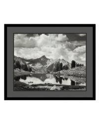 Time appears to stand still in this stunning print from renowned photographer Ansel Adams. Taken in 1925 in the Sierra Nevada mountains, the image pairs crystal-clear elements of earth, air and water for a gorgeous, truly ethereal result.