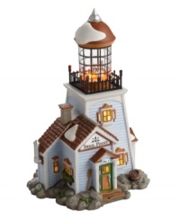 A New England must-have, the Snail Point Lighthouse is a waterfront essential. Set on a rocky landscape and dusted in a light covering of snow, this wintry retreat is an escape from the cold, emanating a seasonal warmth from bright windows and a glowing flame at top.