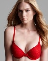 A lace overlay lends allure to this demi bra from Calvin Klein Underwear. Style #F3569