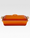 Crafted from heavy stoneware, Le Creuset cookware is the ultimate ingredient for chefs and home cooks worldwide. With its secure lid, this covered casserole is a convenient choice for transporting dishes to parties and picnics. Not only does the lid provide an effective moisture and heat lock for the dish, but it prevents spills and protects its contents.