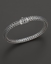 Small sterling woven chain bracelet with carved chain clasp, designed by John Hardy.