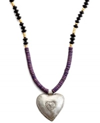 Show heart. Strung with wooden beads and a hand-cut and hammered pendant, this Heart of Haiti necklace is crafted by a co-op that supports women's employment in local communities.