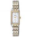 Set a standard for sophistication. Watch by Seiko crafted of two-tone stainless steel bracelet and rectangular case with gold tone bezel, 15mm. White solar-powered dial features applied gold tone stick indices at twelve and six o'clock, two hands and logo. Quartz movement. Water resistant to 30 meters. Three-year limited warranty.