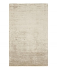 Presenting a solid, silvery hue in soft viscose, the Beckett area rug from Lauren Ralph Lauren offers a chic ground ripe for enhancing any modern setting. Durable enough to withstand heavy indoor traffic, yet luxuriously soft underfoot.