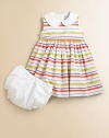 Fresh, fun stripes on crisp cotton in a charming frock for your little fashionista.Contrast Peter Pan collarSleevelessEmpire waist with grosgrain ribbon waistband back tiesBack buttonsFull skirtSolid bloomers with elasticized waist and leg openingsCotton liningCottonMachine washImported Please note: Number of buttons may vary depending on size ordered. 