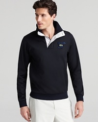 This fleece pullover from Lacoste Golf is a natural for a chilly early-morning round.