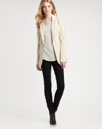 An irresistible take on the classic blazer, this sleek design features creamy leather to complement its crisp, clean lines. Leather along notched collarLong sleevesLeather trimButton closureWelt pocketsFully linedAbout 28 from shoulder to hem48% polyester/48% viscose/4% elastaneDry clean by leather specialistImported Model shown is 5'10 (177cm) wearing US size 4. 