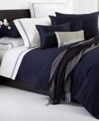 These Water Lily pillowcases from Hugo Boss turn your bed into an oasis of tranquility. 350-thread count cotton sateen fabric provides endless comfort, while baratta stitch embroidery adds a layer of sophistication.