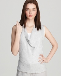 A slinky cowlneck lends elegance to this sleek Eileen Fisher tank for a look that is pure polish. Play up the neckline with over-sized chandelier earrings.