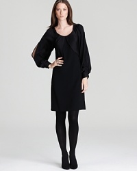 Split raglan sleeves lend chic modernity to Elie Tahari's subtle Corine dress.