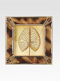 The distinctive colorations of tortoise shell have been cleverly expressed in this frame's striking enamel work, with sparkling Swarovski crystals in complementary hues at each corner.Enamel and crystal18k matte gold finishHandmade, hand-enameled and hand-set2.75 square; holds a 2 square photoImported